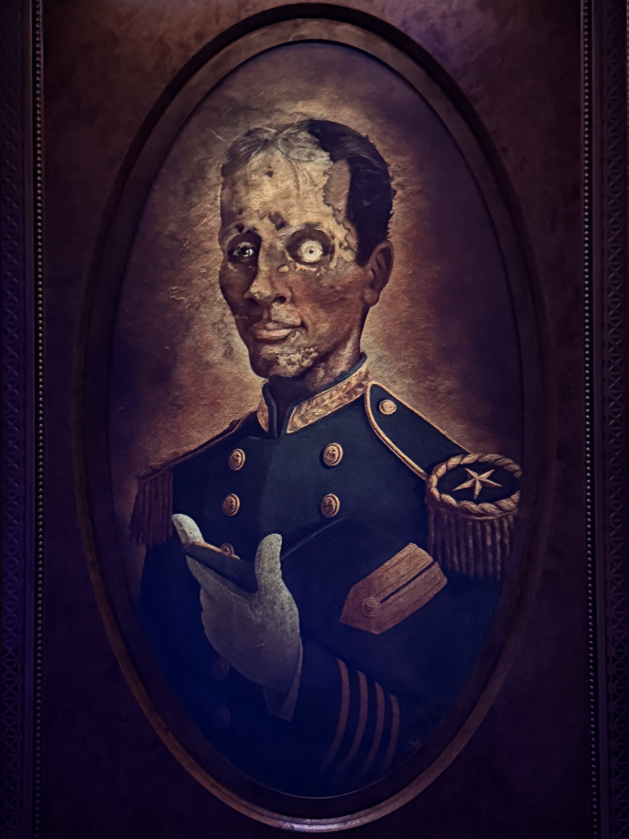 Rotting portrait in the Haunted Mansion Parlor