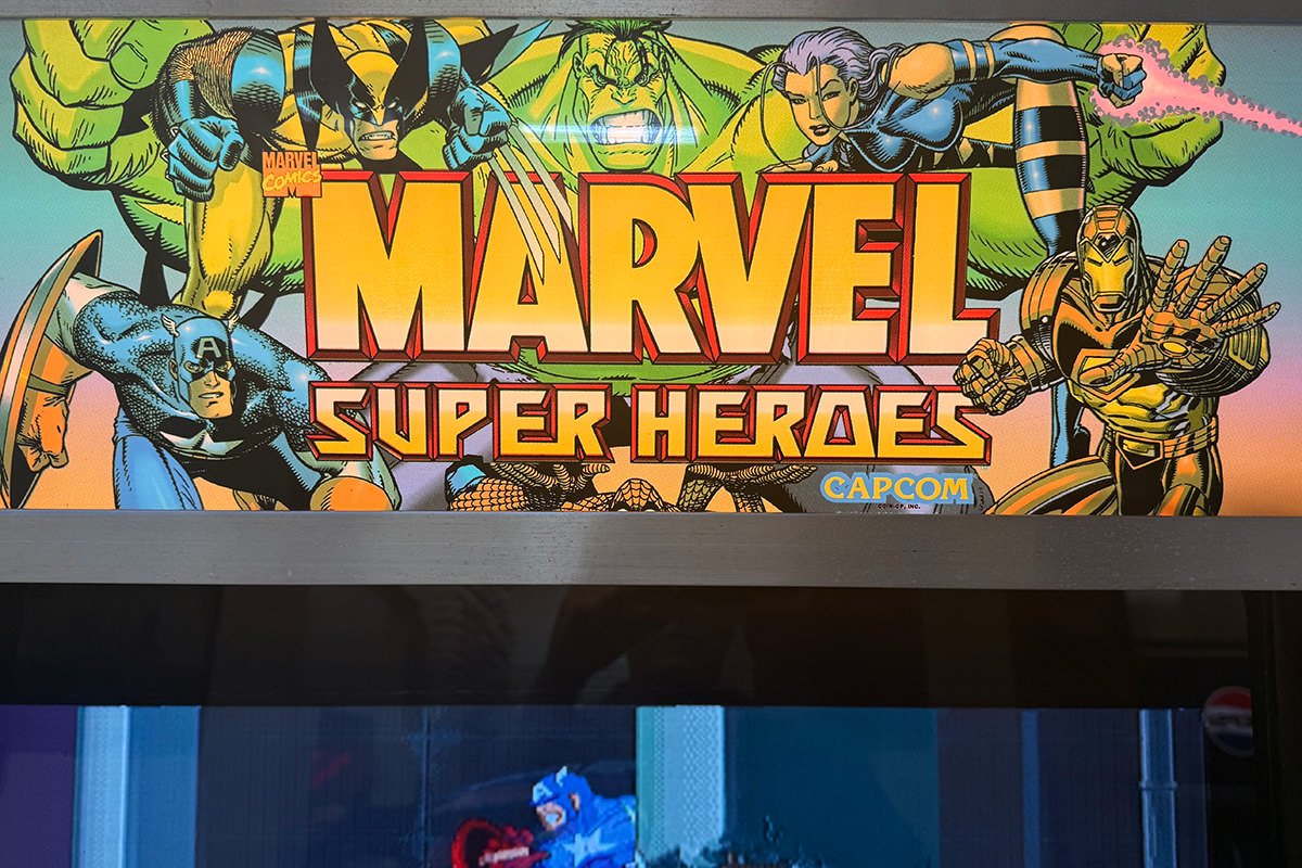 A bunch of Marvel heroes on a a video game machine!