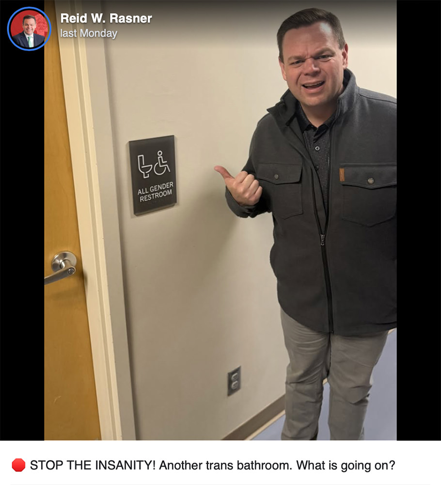Reid Rasner in front of an all-gender restroom